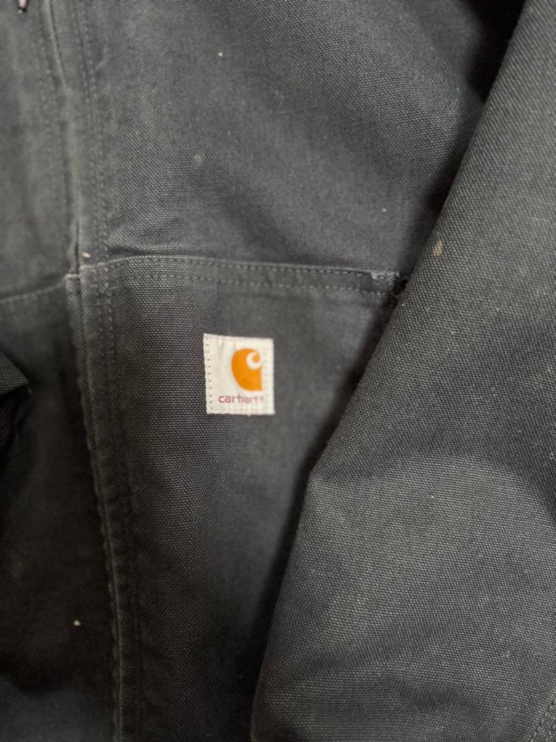 Carhartt フード付き ブラックジャンパー HR Construction