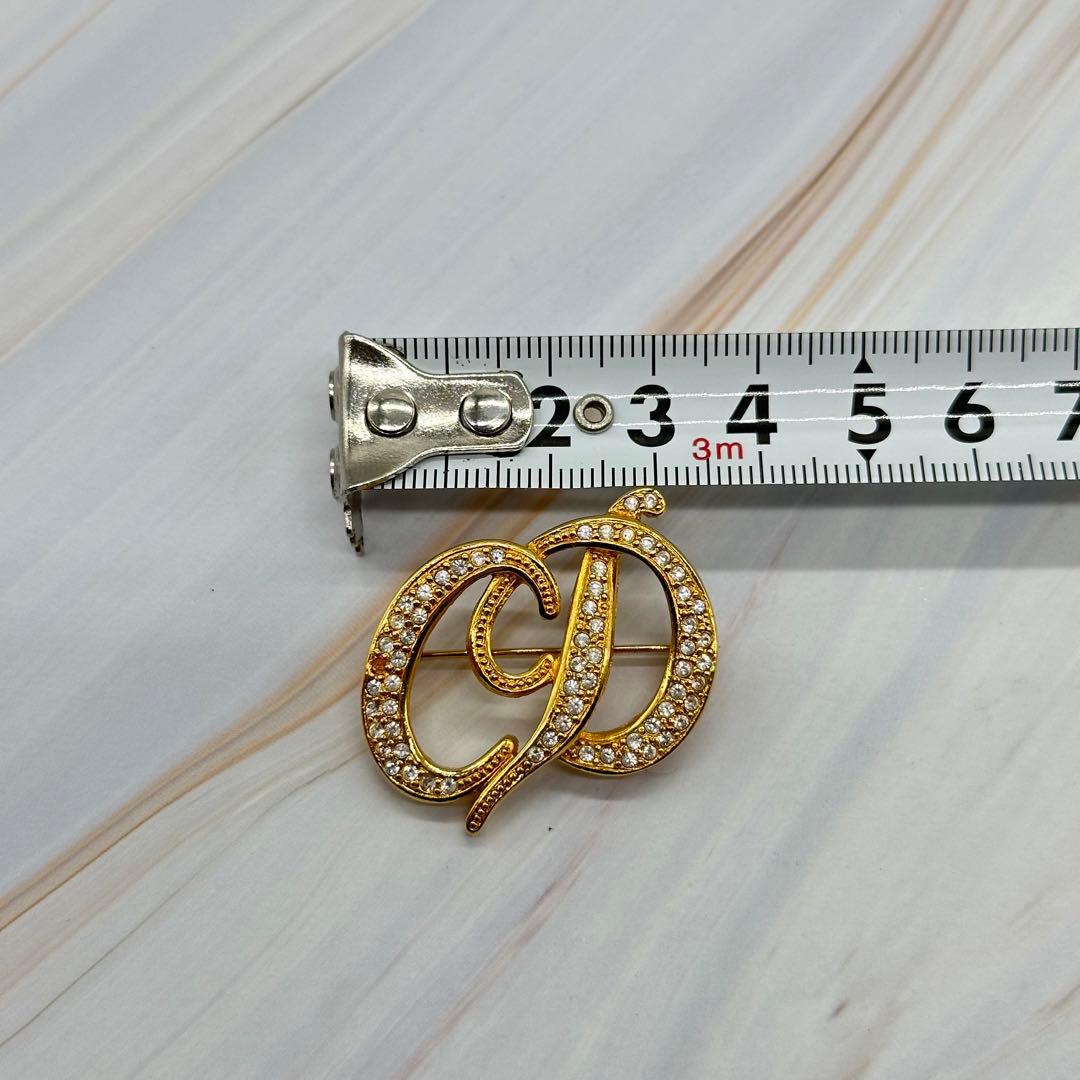 クリスチャンディオール ブローチ CDロゴ ラインストーン ゴールドカラー