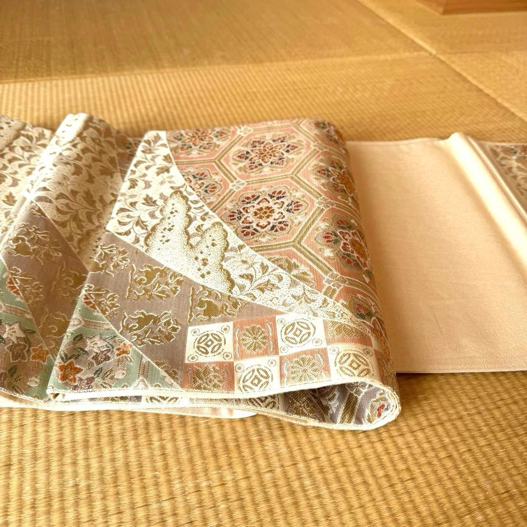 袋帯　花亀甲繋ぎと流水に古典草花文