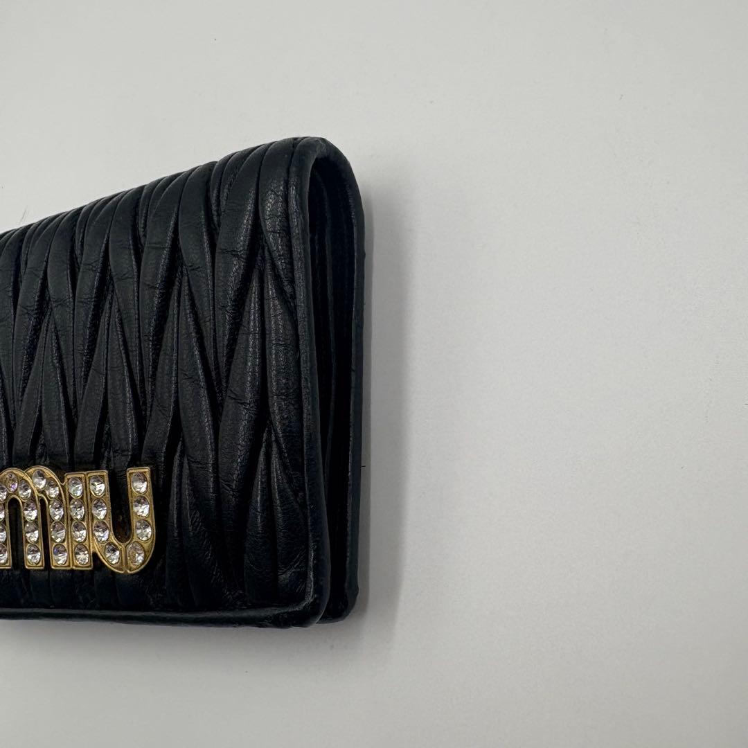 【良品✨】miu miu ミュウミュウ　コンパクトウォレット　ビジュー　革　黒