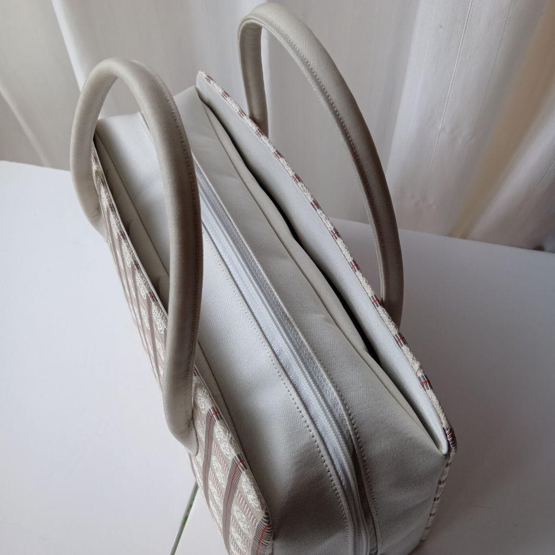 西陣織利休バック　ベージュとレッドの格子柄和装用バッグ