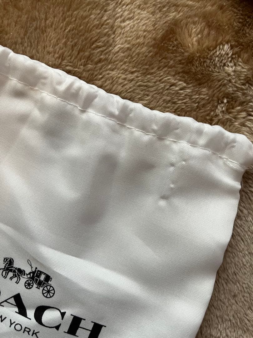 新品　未使用　COACH レオパード柄 二つ折り財布