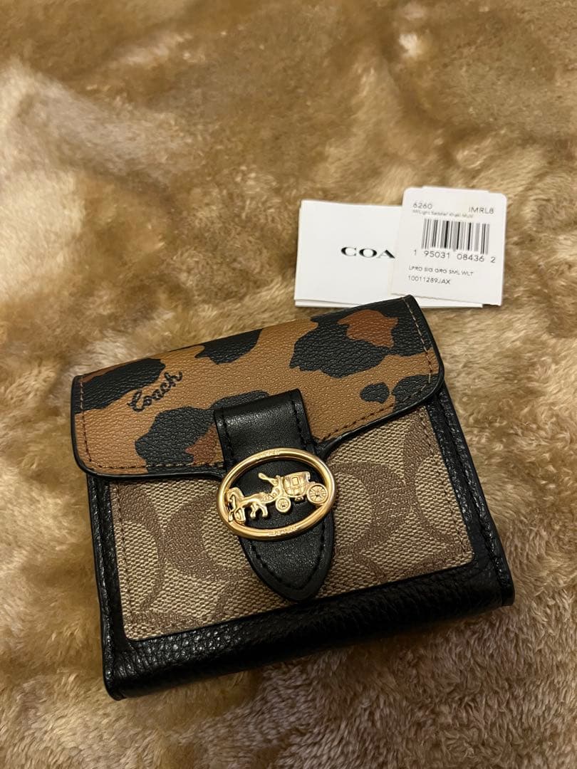 新品　未使用　COACH レオパード柄 二つ折り財布