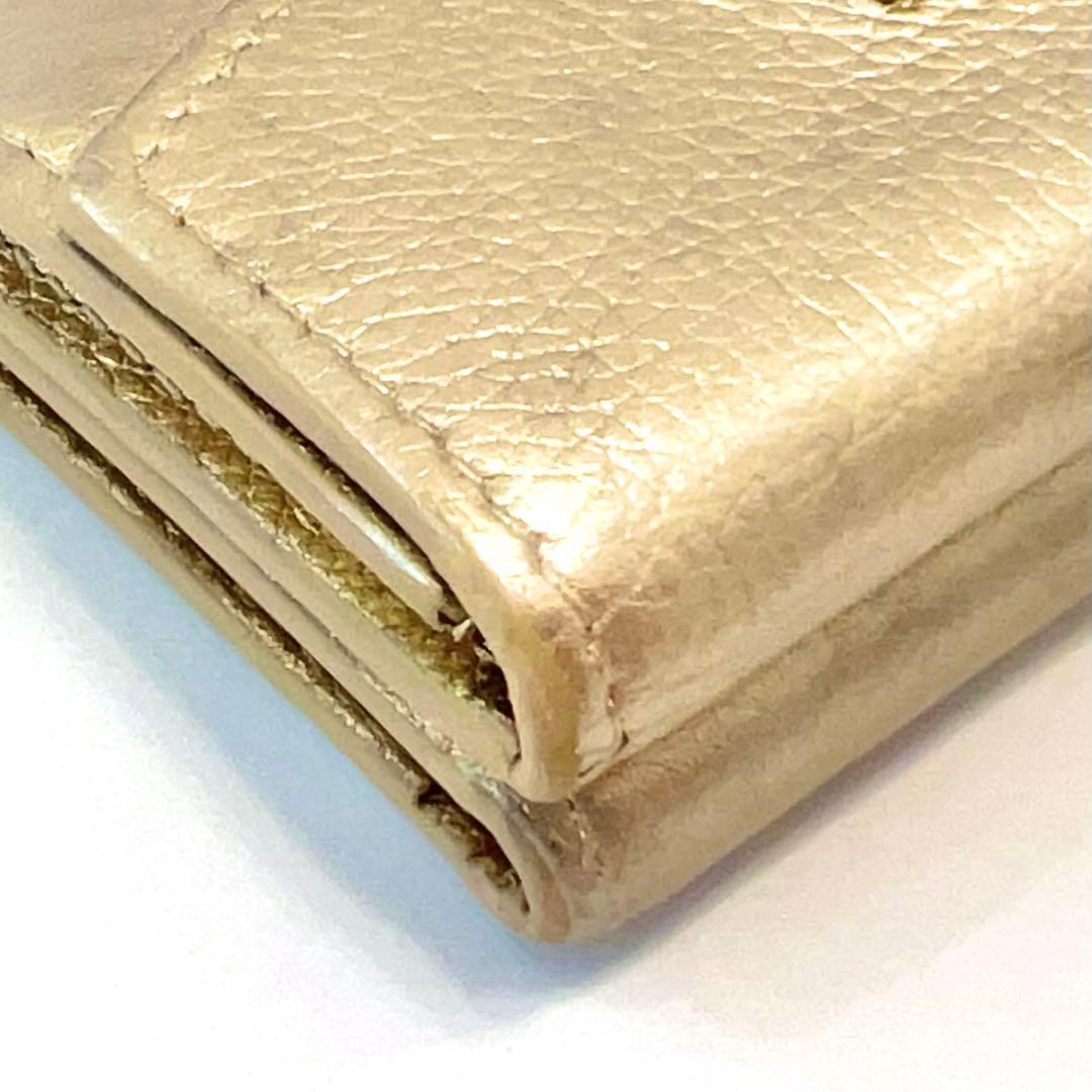 ルイヴィトン ポルトフォイユ ロックミニ 折り財布 ゴールド M69059