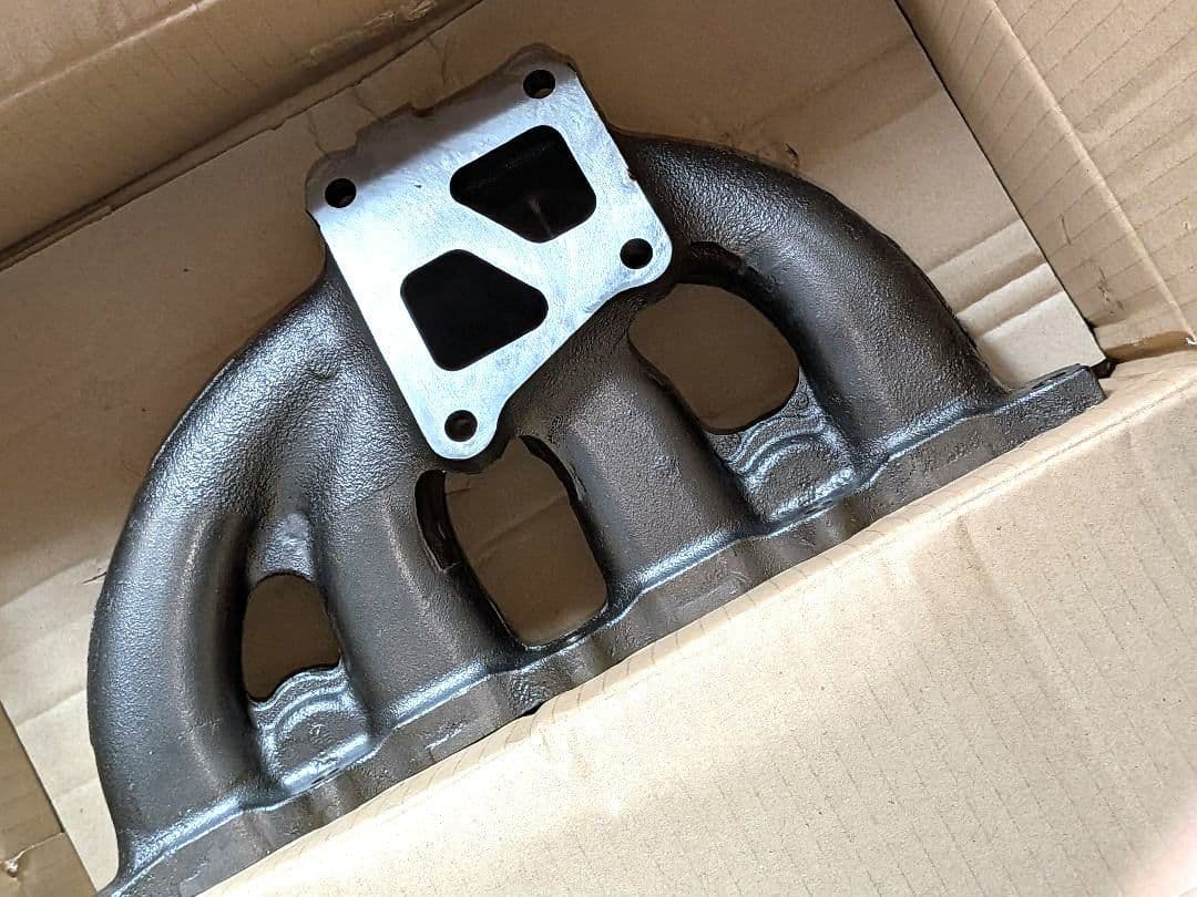 新品！ 半額以下！ランサーエボリューション8 エキゾーストマニホールド 純正品