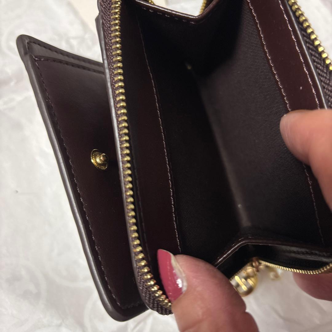 トリーバーチ パイソン柄二つ折り財布