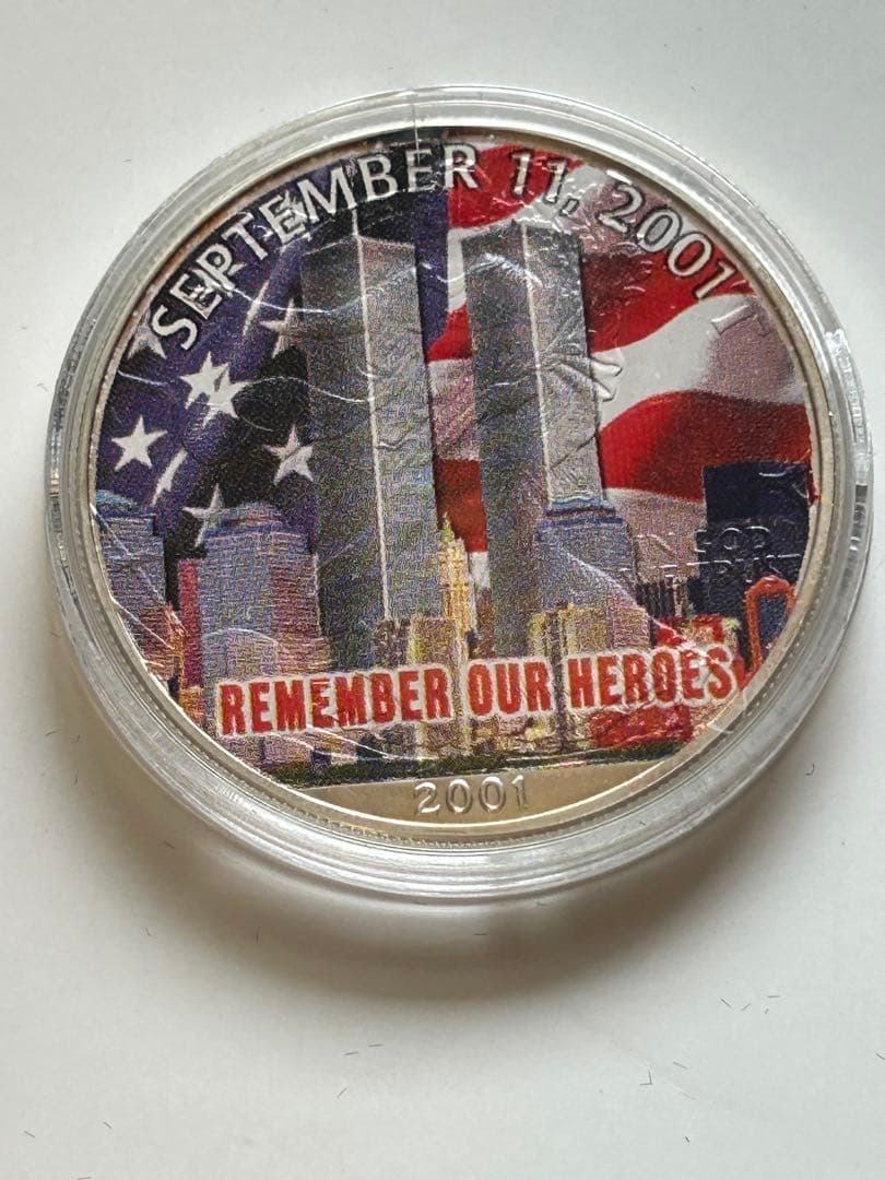 ジ*ト様 2001年9月11日 1オンス純銀