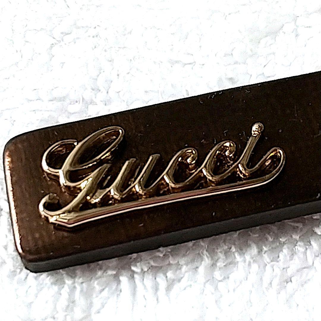 【新品 】 グッチ ストラップ GUCCI 筆記体ロゴ レザー 廃盤 ゴールド