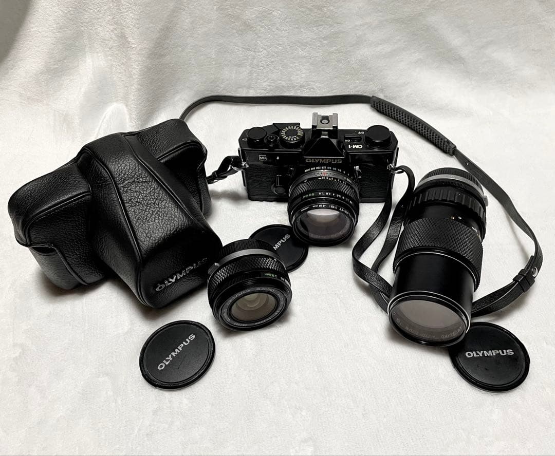 一眼レフカメラ オリンパスOM-INブラックカメラレンズ3本ストロボ等セット