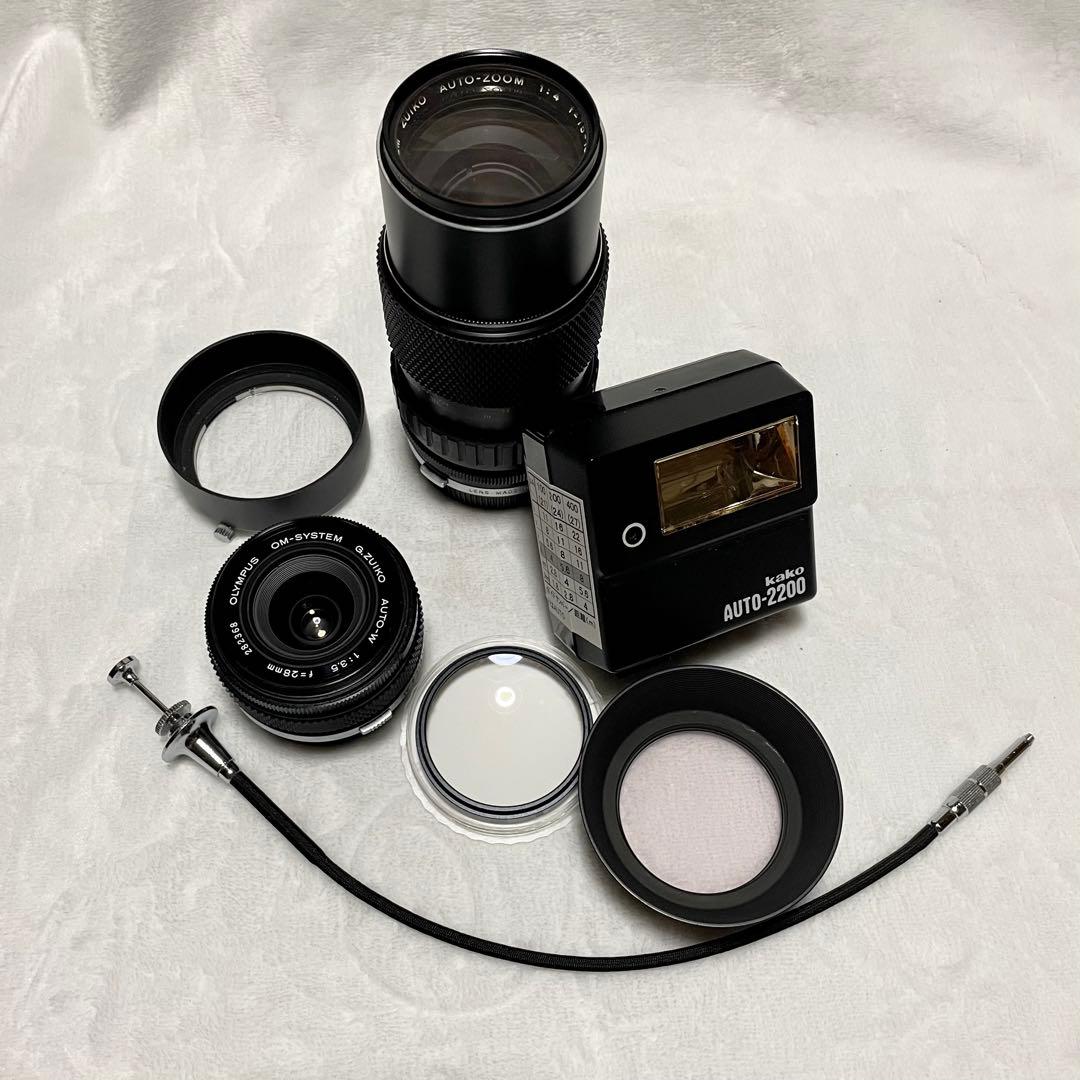 一眼レフカメラ オリンパスOM-INブラックカメラレンズ3本ストロボ等セット