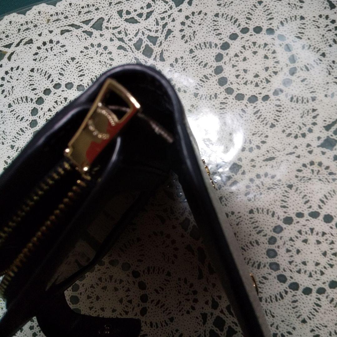 正規品❗️COACHブラックレザー 二つ折り財布 ❣️美品。ゴールドロゴ