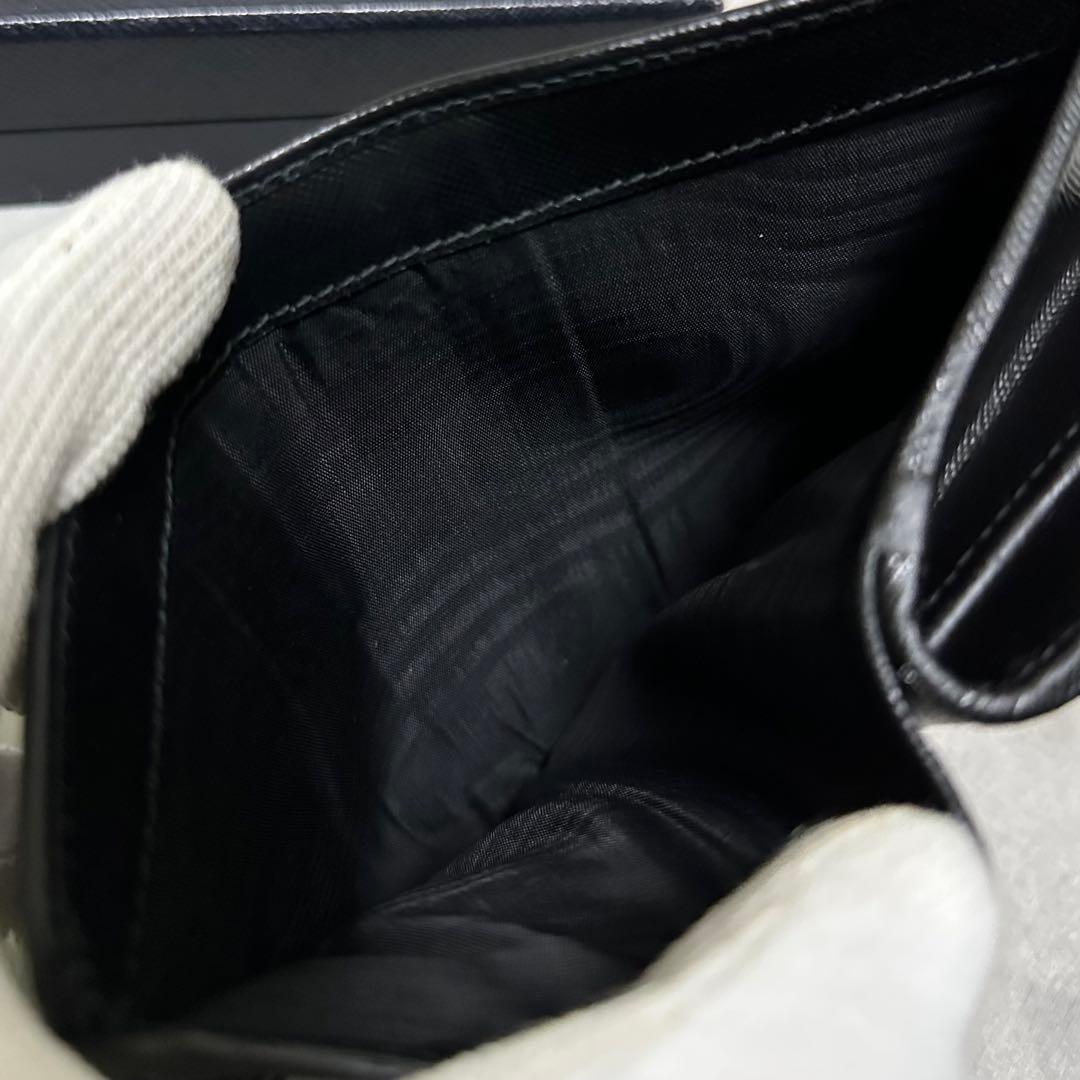 PRADA プラダ　折り財布　ラウンドファスナー　ゴールドロゴ ブラック