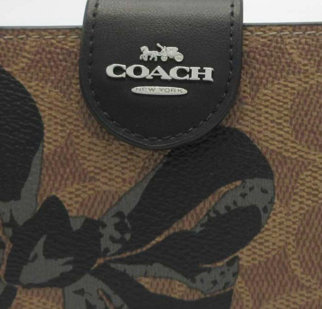 プレゼント 新品未使用 コーチ シグネチャー 二つ折り財布 リボン柄 大人可愛い