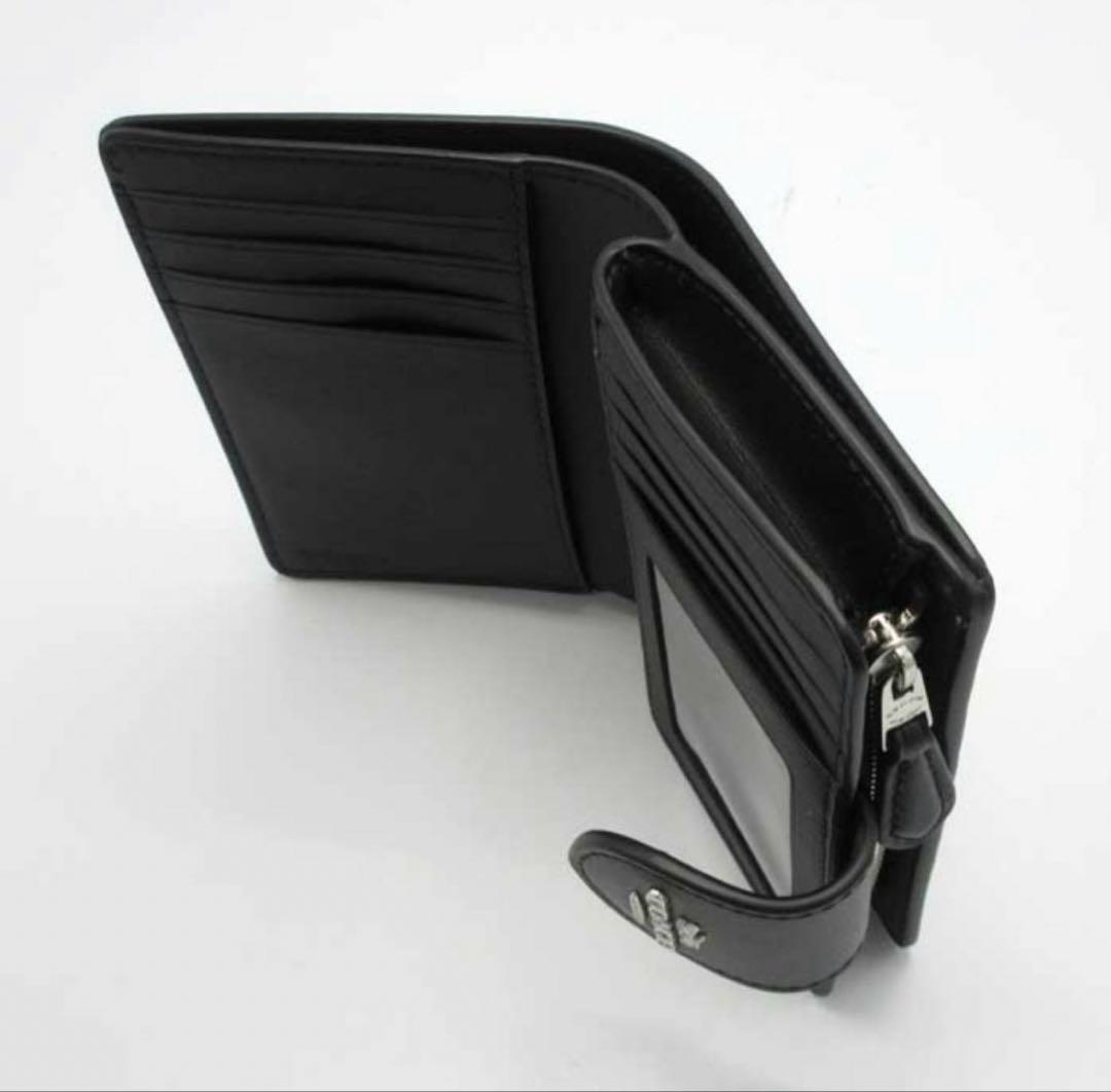 プレゼント 新品未使用 コーチ シグネチャー 二つ折り財布 リボン柄 大人可愛い