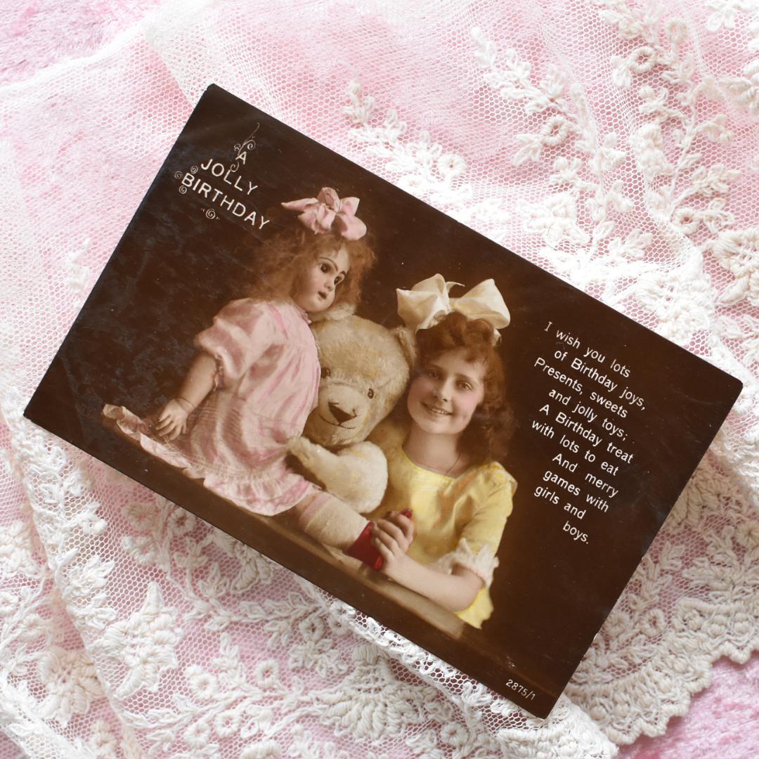 *アンティークポストカード　お人形とテディベアと仲良しな少女*