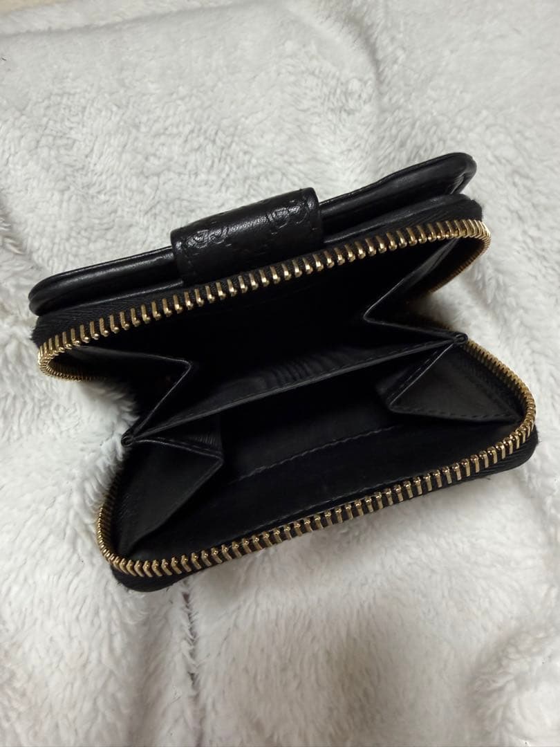 未使用GUCCI 二つ折り財布 ロゴプレート マイクロGG シマレザー 黒
