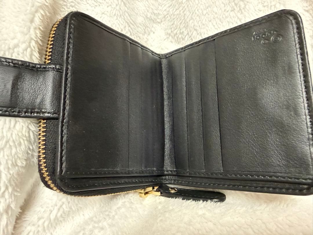 未使用GUCCI 二つ折り財布 ロゴプレート マイクロGG シマレザー 黒