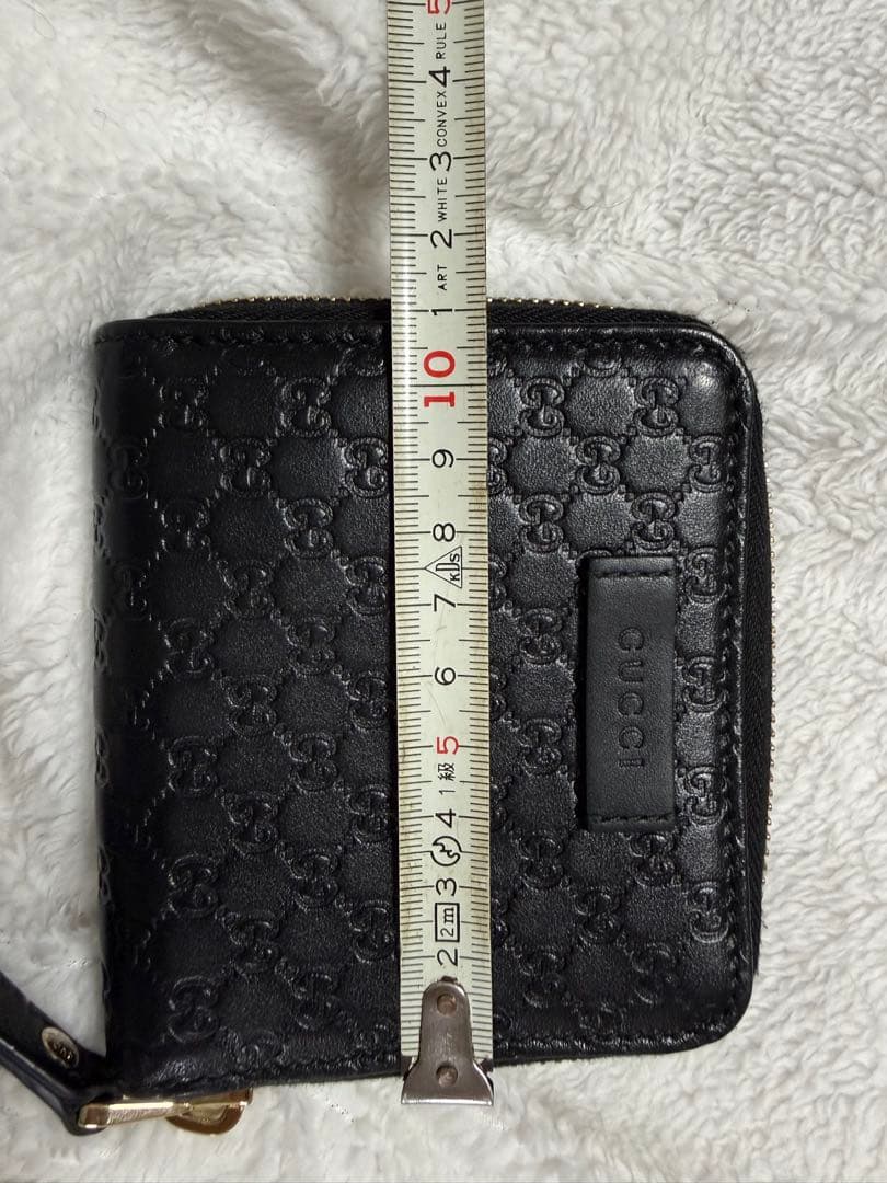 未使用GUCCI 二つ折り財布 ロゴプレート マイクロGG シマレザー 黒