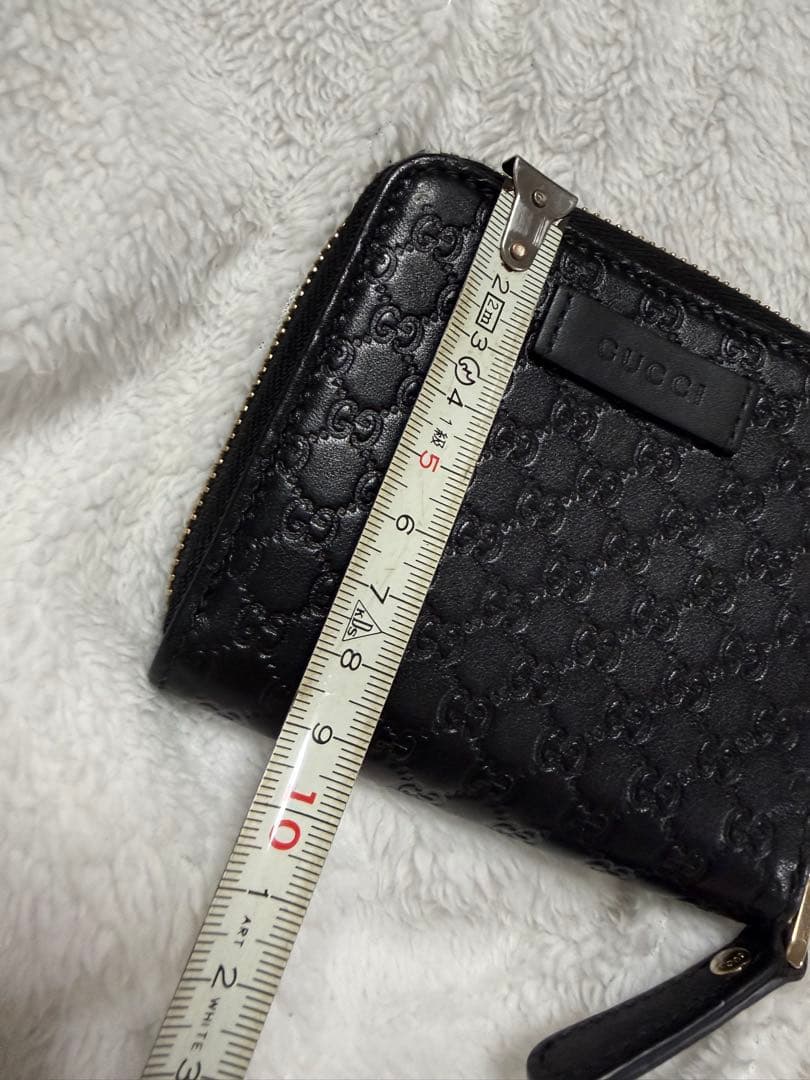 未使用GUCCI 二つ折り財布 ロゴプレート マイクロGG シマレザー 黒