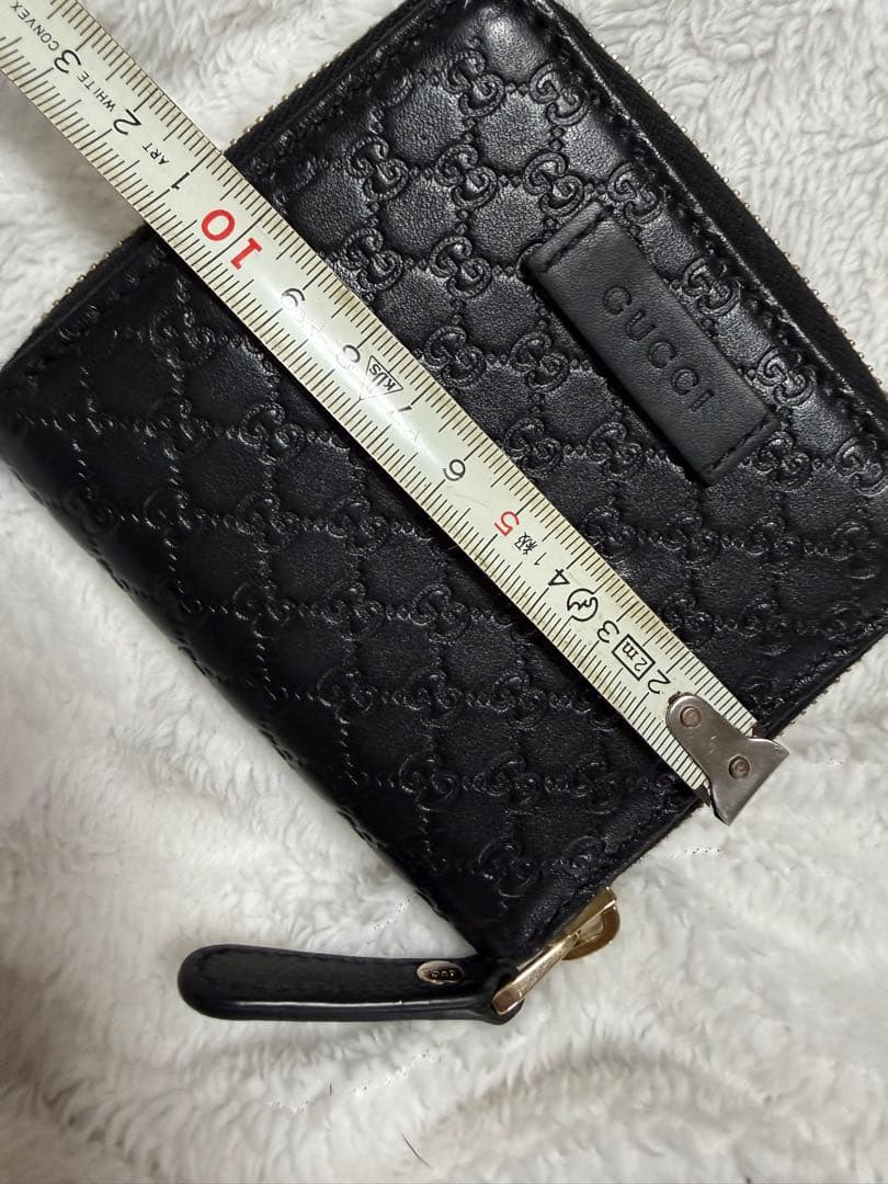 未使用GUCCI 二つ折り財布 ロゴプレート マイクロGG シマレザー 黒