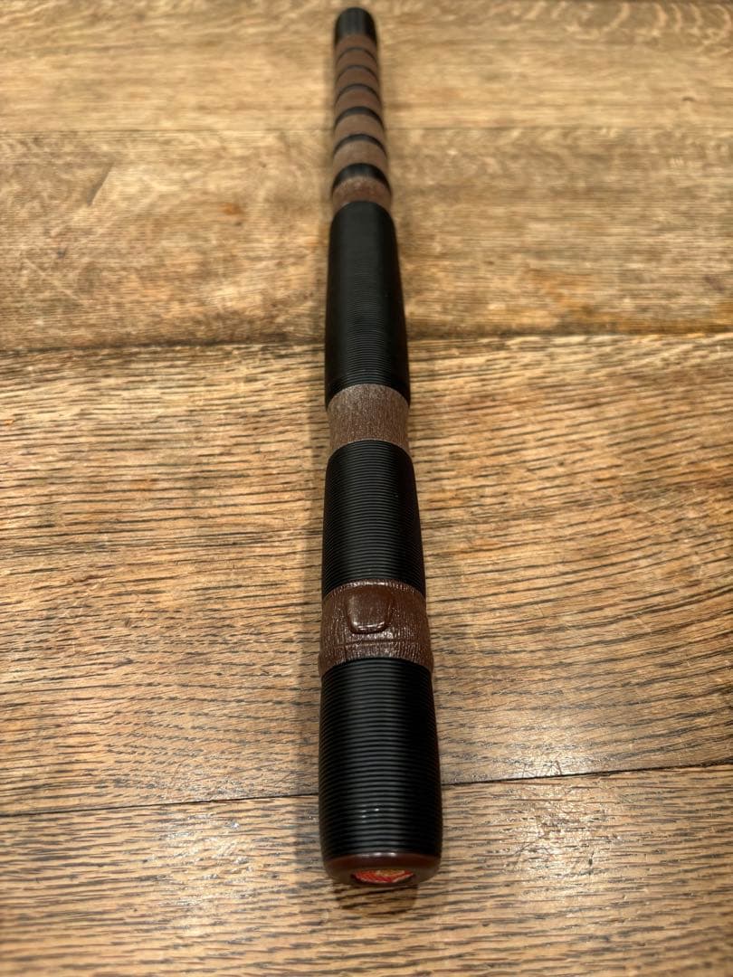 龍笛 横笛 雅楽 樹脂性 クリーニング済み 絞り染めの袋付き