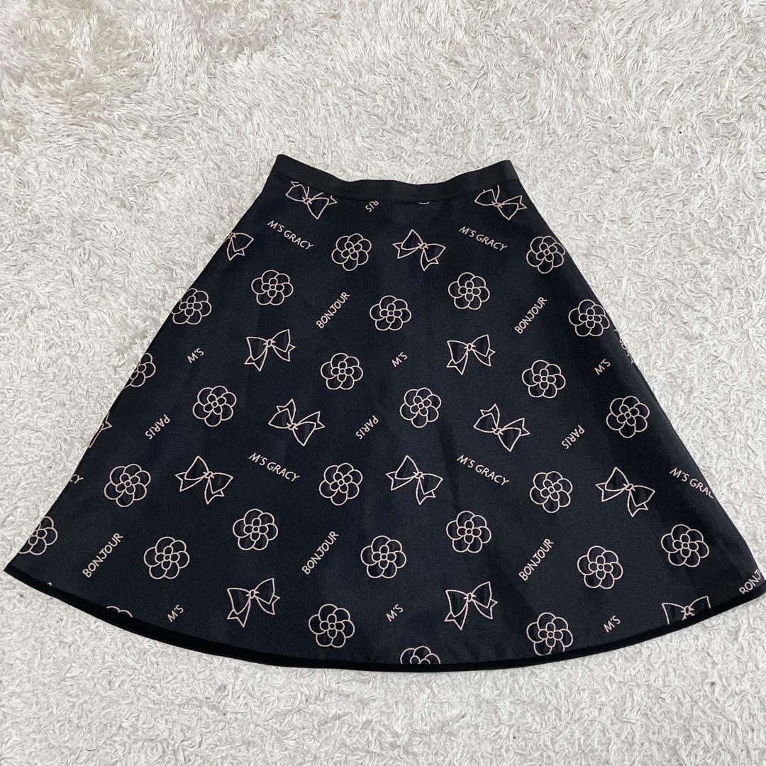 ゆい♪エムズグレイシー　ロゴ　カメリア　チャーム　サーキュラースカート38