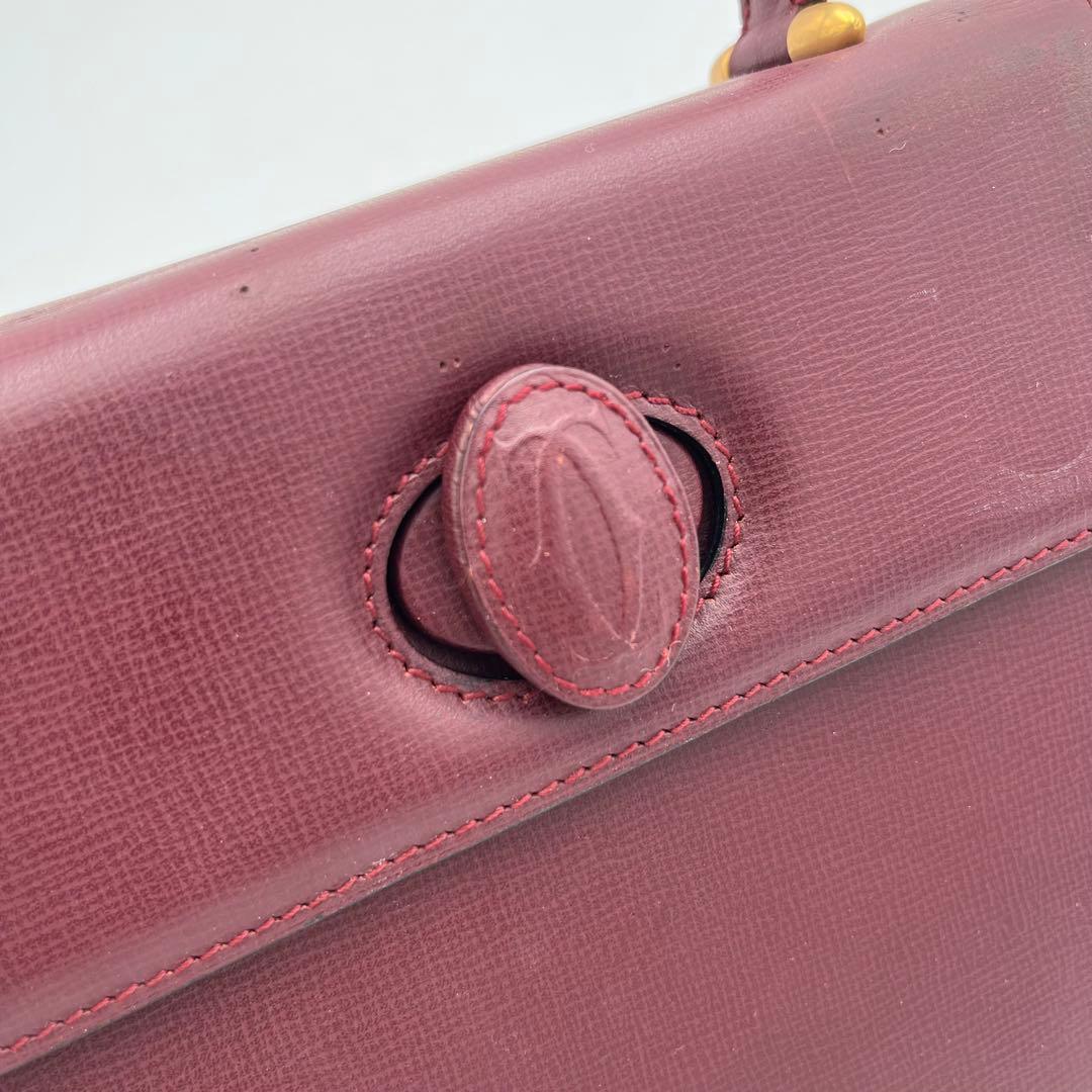 カルテイェ マストライン ターンロック ボックスカーフ ミニハンドバッグ 総柄