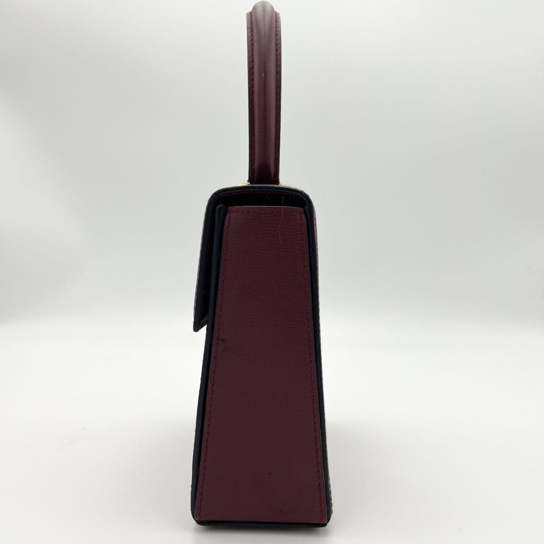 カルテイェ マストライン ターンロック ボックスカーフ ミニハンドバッグ 総柄