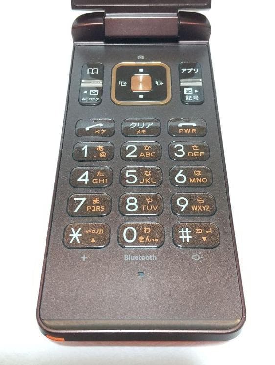 GRATINA KYY06 折りたたみ式携帯電話 オレンジ