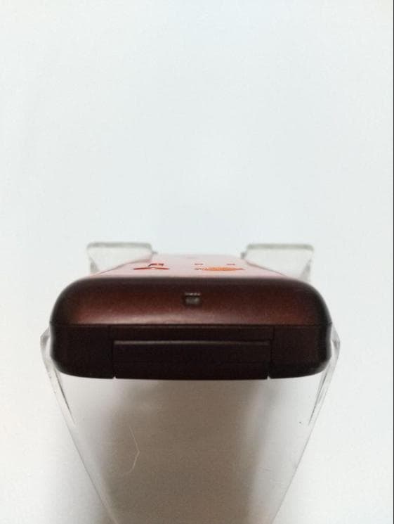 GRATINA KYY06 折りたたみ式携帯電話 オレンジ