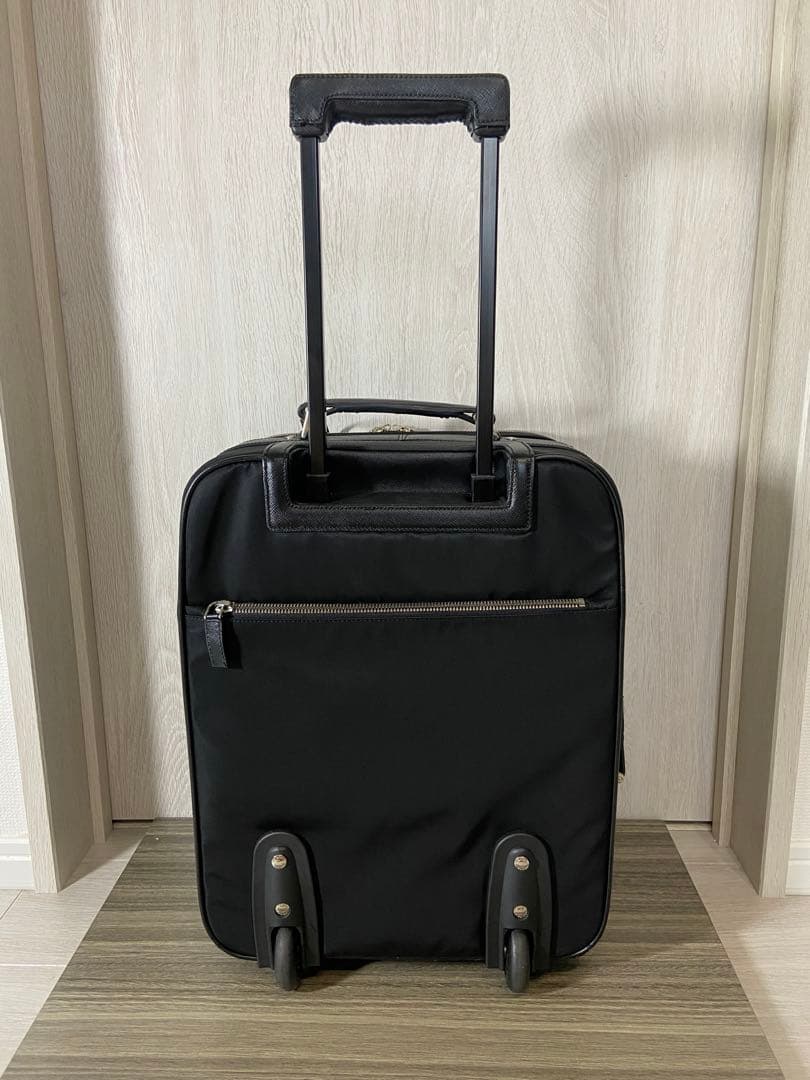 PRADA スーツケース　キャリーケース　ナイロン　レザー　三角ロゴプレート　黒