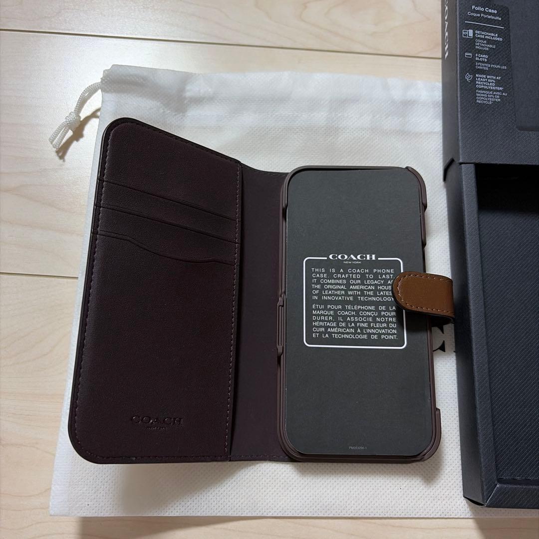 コーチiPhone15 PRO ケース シグネチャー 手帳型 スマホケース 収納