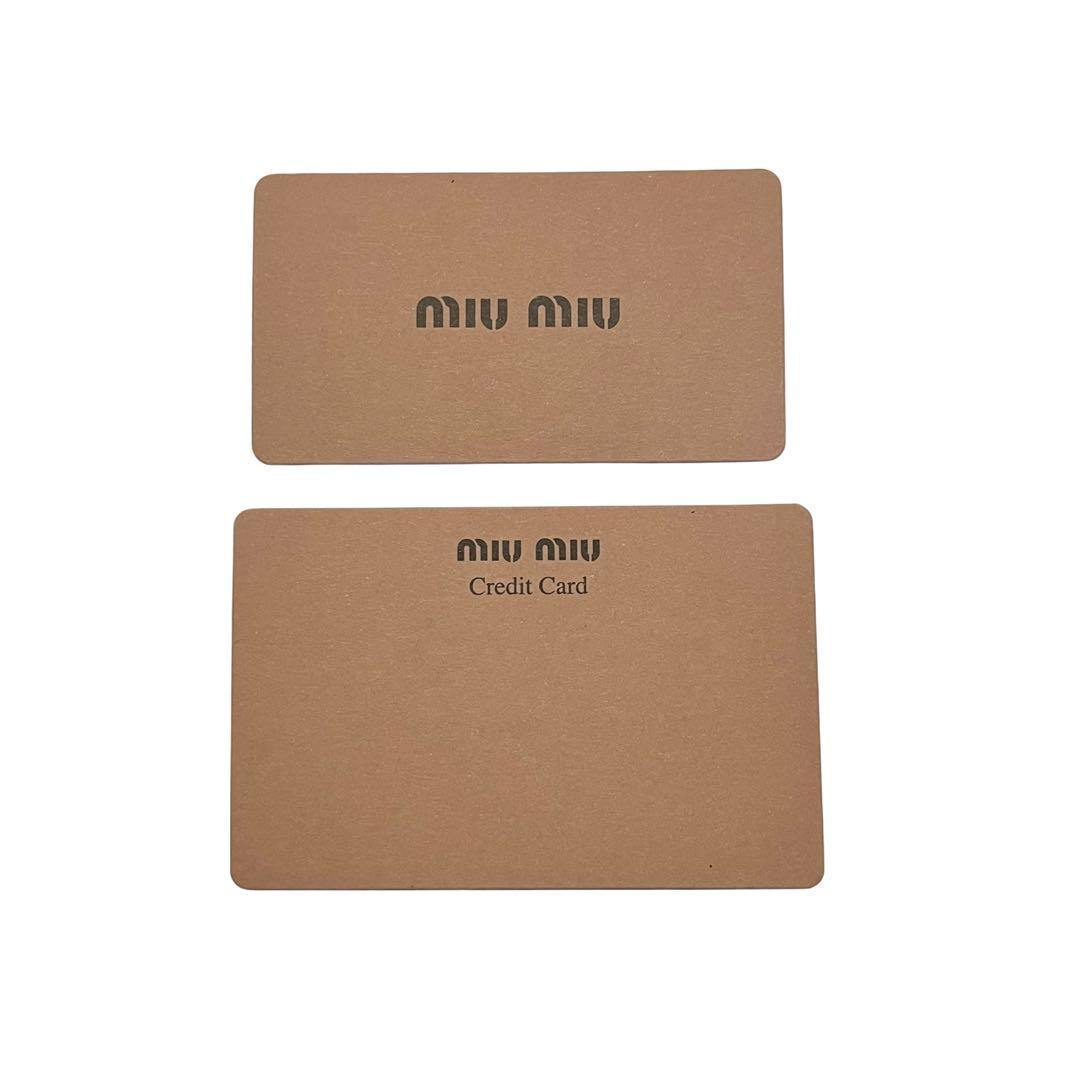 希少✨ミュウミュウ 二つ折り財布 マテラッセ レザー ロゴ金具 ブラック 黒