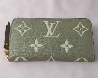 美品 M69794バイカラー 長財布 トゥルトレール クレーム