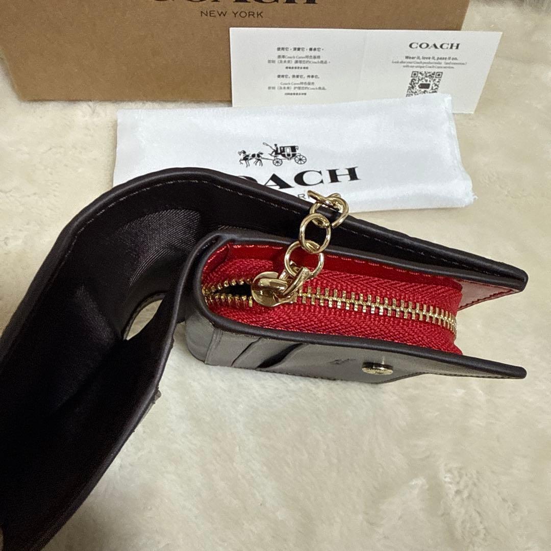 COACH 赤 エナメル 二つ折り財布